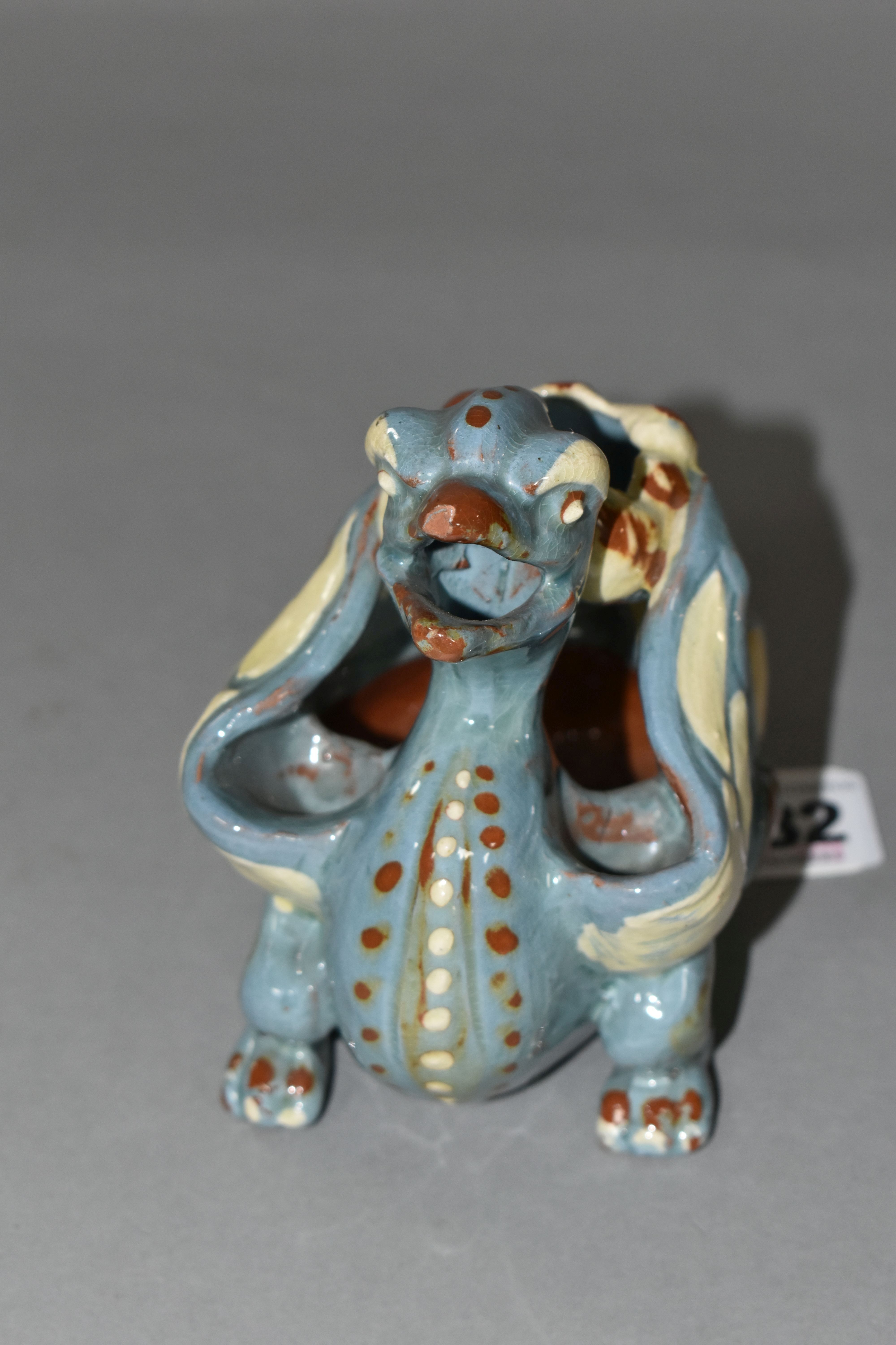 A C.H BRANNAN POTTERY 'GRIFFIN' CANDLE/SPILL HOLDER, incised CH Brannam, Barum, dated 1894, slip - Image 2 of 6