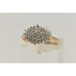 A 9CT GOLD DIAMOND CLUSTER RING, designed as single cut diamonds in a tiered cluster, approximate