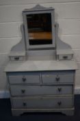 A GREY PAINTED PINE DRESSING CHEST, with a single swing mirror, six various drawers, width 96cm x