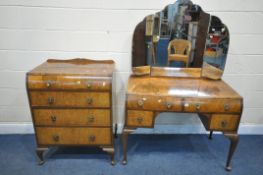 AN EARLY TO MID 20TH CENTURY WALNUT DRESSING TABLE, with a triple swing mirror, four various