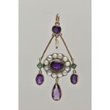 AN AMETHYST, EMERALD AND SPLIT PEARL PENDANT, designed as a central oval amethyst within a split