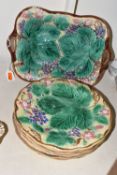 A SEVEN PIECE WEDGWOOD MAJOLICA PART DESSERT SERVICE, decorated with relief moulded vines and