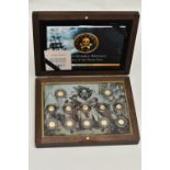 A BOXED SMALL GOLD COIN COLLECTION OF 12 X 0.5 gram, Ivory coast proof coins Pirates of the Seven