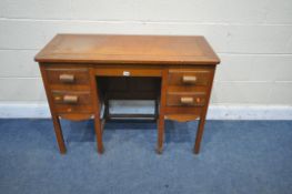 A 20TH CENTURY OAK KNEEHOLE DESK, with four drawers, length 105cm x 46cm x height 76cm, along with a