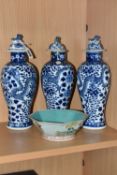 A NEAR SET OF THREE 19TH CENTURY CHINESE BLUE AND WHITE PORCELAIN BALUSTER VASES WITH MATCHED COVERS