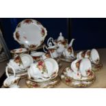 A FORTY PIECE ROYAL ALBERT OLD COUNTRY ROSES TEA SET, comprising a teapot, a cake plate, a cake