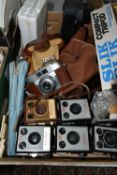 A BOX OF CAMERAS AND PHOTOGRAPHY EQUIPMENT, to include a cased Agfa camera with f2.8 45mm lens, a