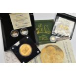 A CASED SET OF WINNIE THE POOH, EDWARD BEAR PURE GOLD COMMEMORATIVE SET OF PROOF COINS, 4.5 gram
