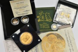 A CASED SET OF WINNIE THE POOH, EDWARD BEAR PURE GOLD COMMEMORATIVE SET OF PROOF COINS, 4.5 gram