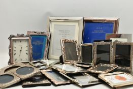 A BOX OF ASSORTED SILVER PLATED PHOTO FRAMES, twenty four frames varying in size, together with a '