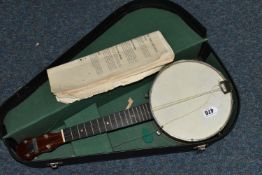 A CASED GEORGE FORMBY UKULELE BANJO, plaque reading 'George Formby, Registered' to headstock,