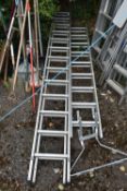A YOUNGMAN ALUMINIUM 26 RUNG EXTENSION LADDER, a Stairmaster 18 rung extension ladder, and a