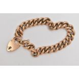 A ROSE METAL CURB LINK BRACELET, hollow links, fitted with a heart padlock clasp, stamped 9ct,