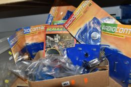TWO BOXES OF RADIO CONTROL PARTS, ETC, to include twenty eight Radio Control partworks (most still
