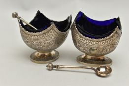 A PAIR OF VICTORIAN SILVER PEDESTAL SALTS IN THE INDIAN TASTE, of shaped square form with engraved