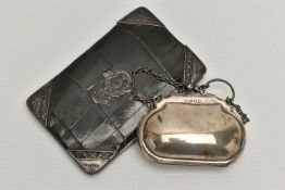 A LATE VICTORIAN SILVER MOUNTED GREEN CROCODILE SKIN WALLET AND A SMALL GEORGE V SILVER PURSE ON