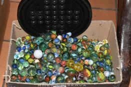 ONE BOX OF VINTAGE MARBLES, with a plastic Solitaire board, assorted colours and styles, condition