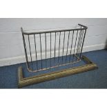 A VICTORIAN BRASS SPINDLED NURSERY FENDER, length 110m x depth 34cm x height 69cm, and a brass