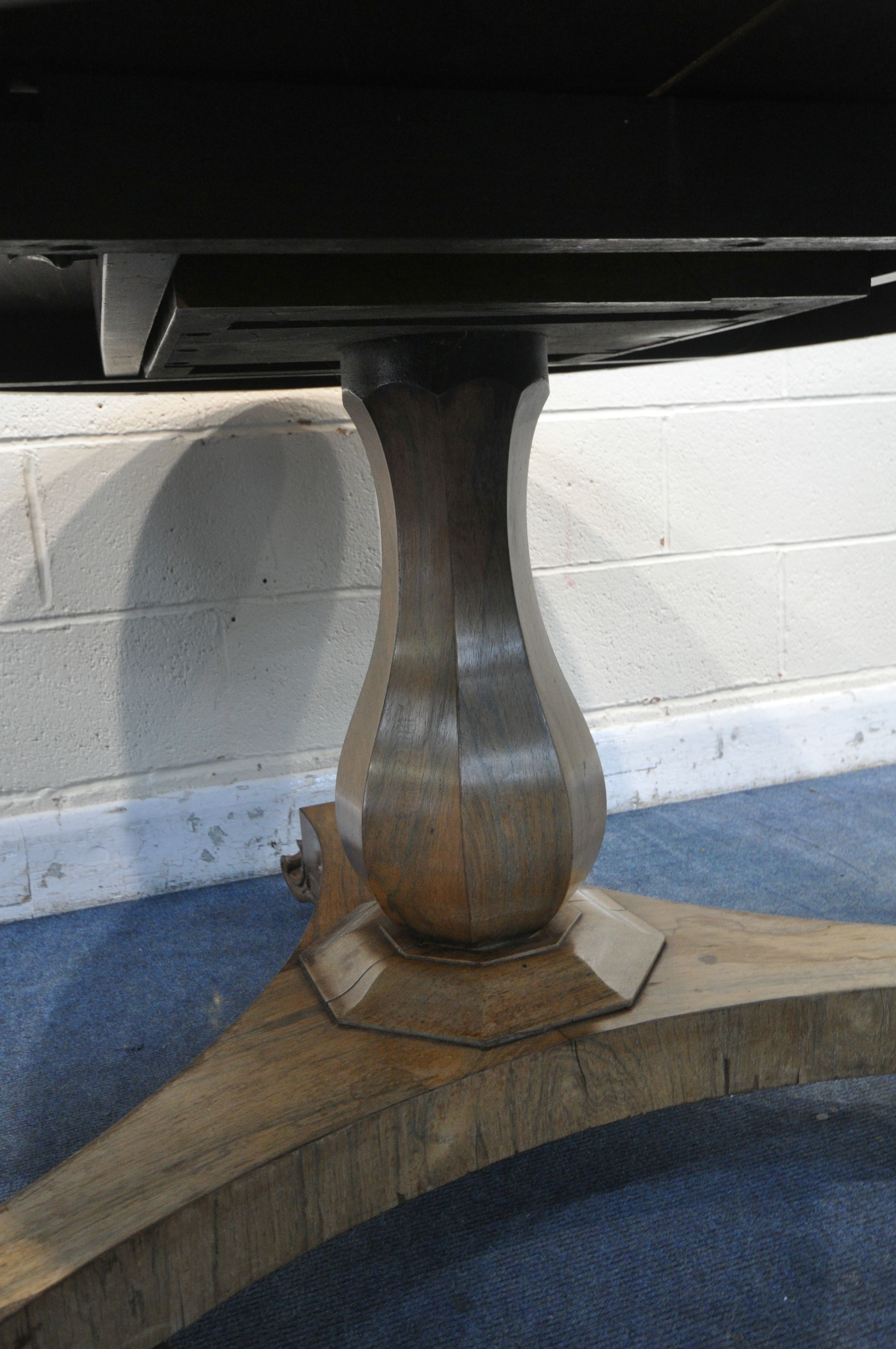 A 19TH CENTURY ROSEWOOD TILT TOP CIRCULAR BREAKFAST TABLE, on a bulbous column and triform base, - Image 4 of 5