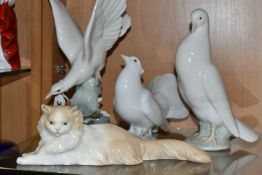 TWO LLADRO DOVES, A NAO DOVE AND A NAO CAT, comprising Lladro Turtle Dove, model no 4550, perched on