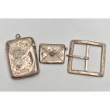 A SILVER VESTA CASE, STAMP HOLDER AND A BELT BUCKLE, the rounded rectangular vesta case, decorated