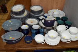 A COLLECTION OF DENBY DINNERWARE, comprising two 'Batik' footed mugs, two 'Harlequin' mugs, two '