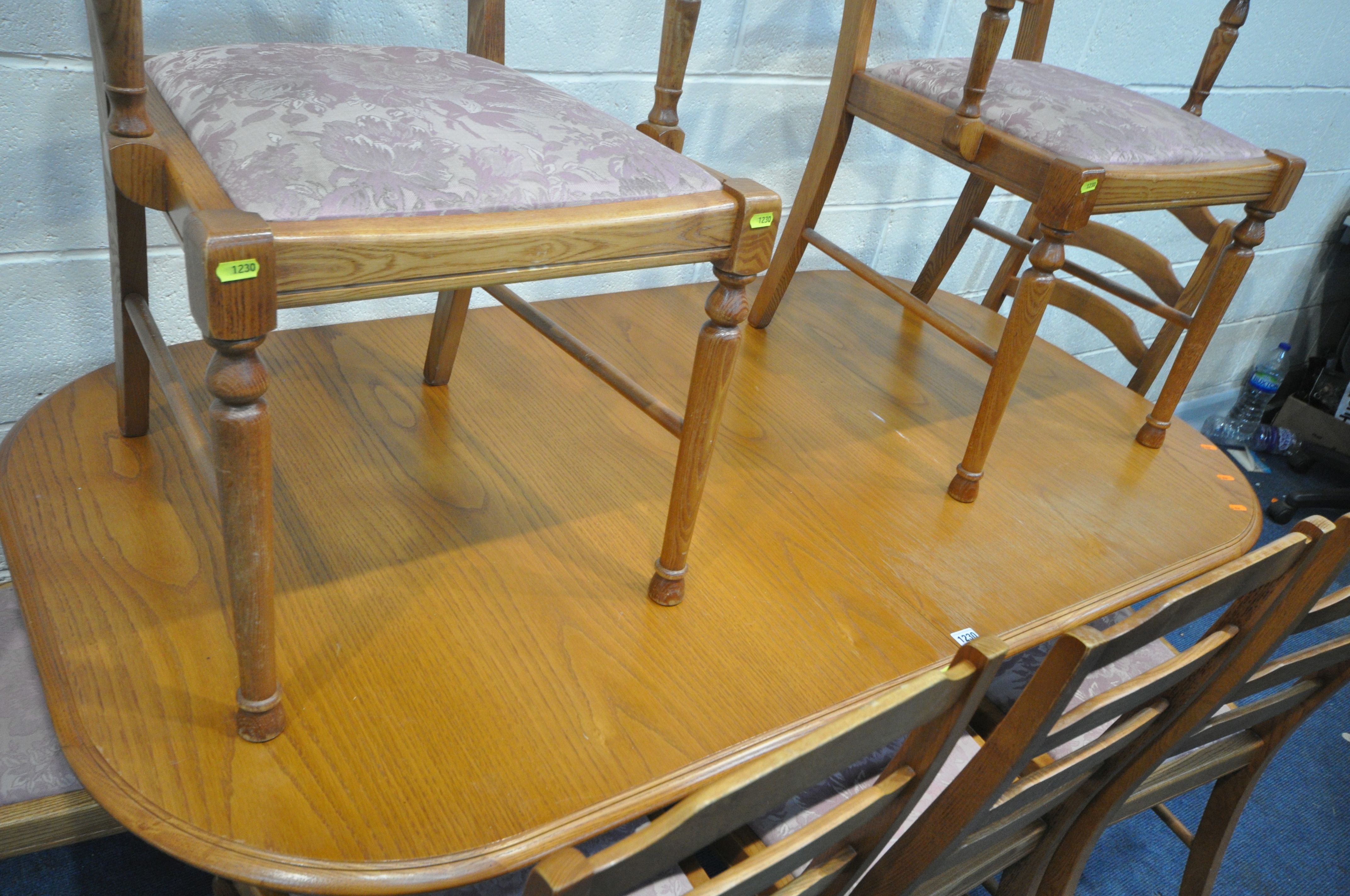 A JENTIQUE OAK OVAL EXTENDING DINING TABLE, open length 211cm x closed length 165cm x depth 93cm x - Image 3 of 7