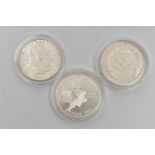 THREE UNITED STATES SILVER ONE DOLLAR COINS, to include Olympiad Liberty 1988, Thirty Eighth