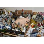FOUR BOXES OF CERAMIC ORNAMENTS, to include Oriental figurines, Foo dogs, novelty teapots, Buddha