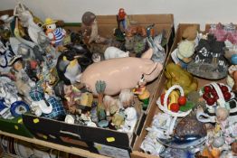 FOUR BOXES OF CERAMIC ORNAMENTS, to include Oriental figurines, Foo dogs, novelty teapots, Buddha