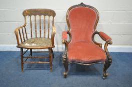 A VICTORIAN WALNUT SPOON BACK OPEN ARMCHAIR, with foliate carved cresting, pink upholstered back,