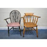 A VICTORIAN ELM SEATED CAPTAINS CHAIR, with spindled supports, united by turned stretchers, along