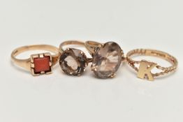 FOUR 9CT GOLD RINGS, to include a coral set signet ring, two smoky quartz set rings, and an