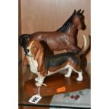 A BESWICK BASSET HOUND AND HORSE, both matt glaze, comprising Basset Hound 'Fochno Trinket' - on