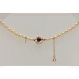 A CULTURED PEARL NECKLACE, single row of cultured cream pearls, each measuring approximately 6.