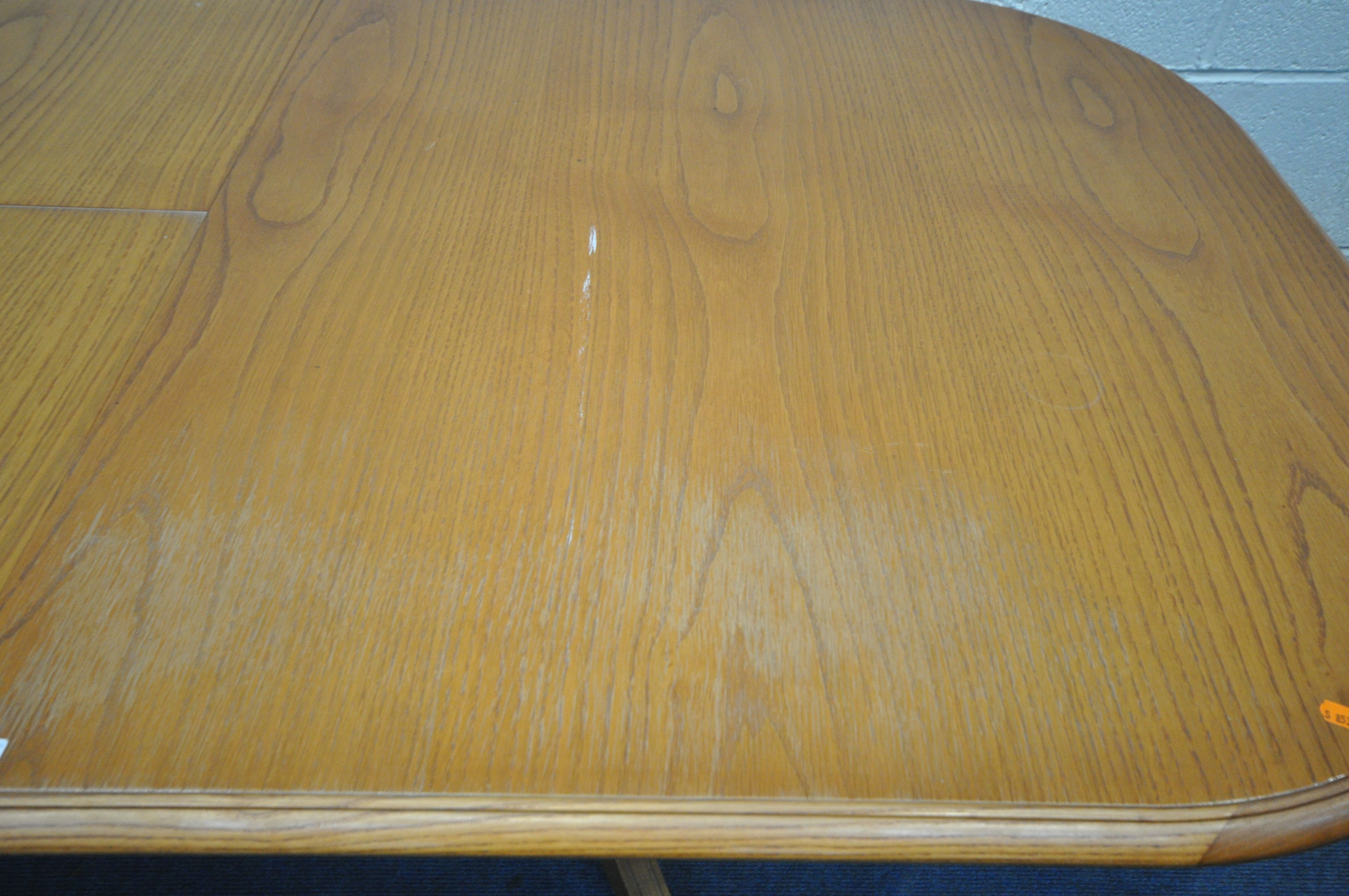 A JENTIQUE OAK OVAL EXTENDING DINING TABLE, open length 211cm x closed length 165cm x depth 93cm x - Image 5 of 7