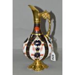 A ROYAL CROWN DERBY SWAN NECKED VASE, in Old Imari 1128 pattern with solid gold band, height 25cm,