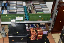 FOUR BOXES, TWO CD RACKS AND ONE CASE, containing a large collection of (several hundred) CD's,