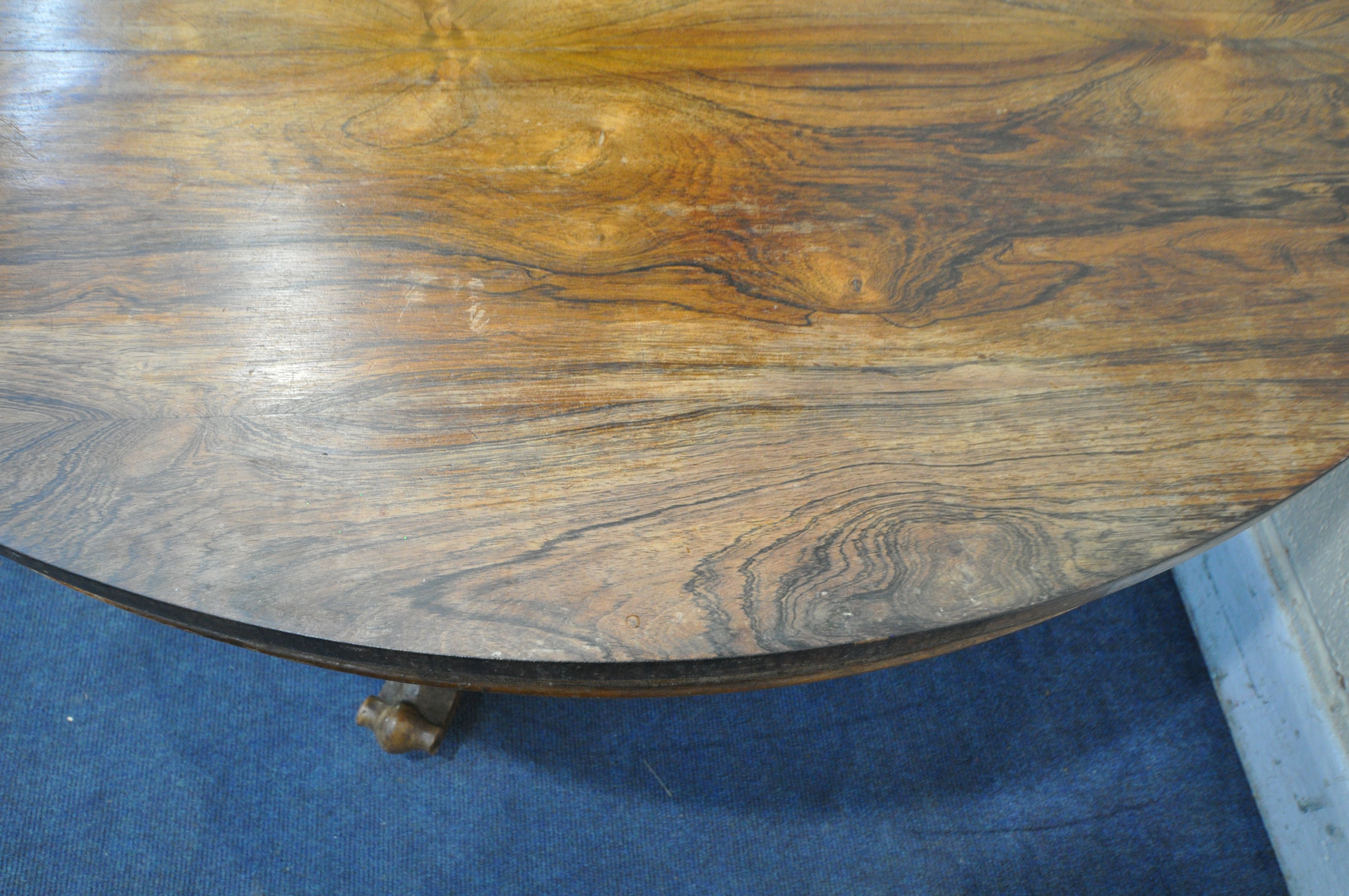 A 19TH CENTURY ROSEWOOD TILT TOP CIRCULAR BREAKFAST TABLE, on a bulbous column and triform base, - Image 3 of 5