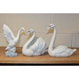 TWO LLADRO SWANS AND A NAO DUCK, comprising a Swan with wings spread, no 5231, issued 1984-2004,