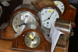 FIVE WOODEN CASED MANTEL CLOCKS, comprising one clock with satinwood inlay decoration and four oak