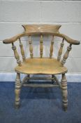 A 20TH CENTURY BEECH CAPTAINS CHAIR, width 68cm x depth 55cm x height 82cm (condition - ideal for