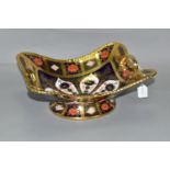 A ROYAL CROWN DERBY TWIN HANDLED BASKET, in Old Imari 1128 pattern with solid gold band, of