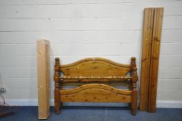 A MODERN PINE 4FT6 BEDSTEAD, with siderails and slats (condition - nails sticking out of side