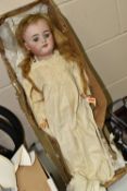 A BOXED LATE 19TH / EARLY 20TH CENTURY GERMAN BISQUE HEADED DOLL, with sleeping eyes, open mouth