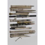 A BAG OF ASSORTED SILVER AND WHITE METAL PENCILS, to include two silver pencils, both with