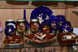 A COLLECTION OF CARLTON WARE, comprising six pieces of Peacock and Blossoms pattern including vases,