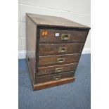 AN OAK CHEST OF FIVE DRAWERS, with campaign style handles, width 55cm x depth 72cm x height 76cm (