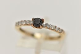 A DIAMOND RING, designed as a central brilliant cut treated black diamond in a four claw setting