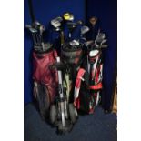 THREE GOLF BAGS containing various golf clubs to include Dunlop, Mitsushiba, Slazenger etc